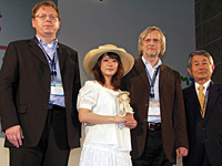 『屋根裏のポムネンカ』ジャパンプレミアに登壇した（左より）ミロスラフ・シュミットマイエル氏、貫地谷しほりさん、イジー・バルタ監督、真部利治氏。